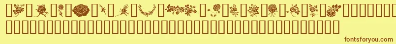 フォントRosegarden – 茶色の文字が黄色の背景にあります。