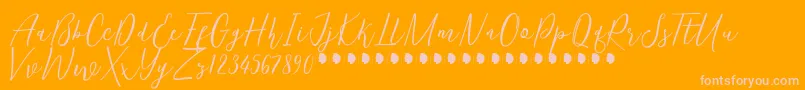KentuckyFree-fontti – vaaleanpunaiset fontit oranssilla taustalla