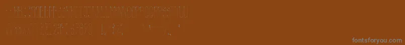 Więcej informacji o czcionce Globe Czcionka Globe – szare czcionki na brązowym tle