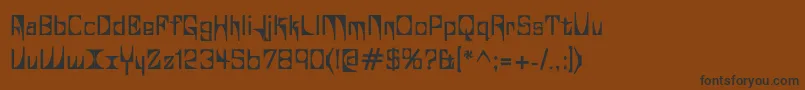 フォントGlaukv – 黒い文字が茶色の背景にあります