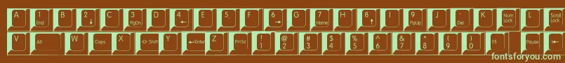 フォントSpslkeys – 緑色の文字が茶色の背景にあります。