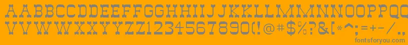Fonte Drygulchflf – fontes cinzas em um fundo laranja