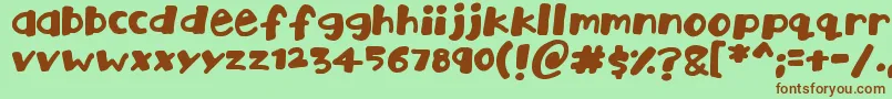 Playtime Font – Brown Fonts on Green Background