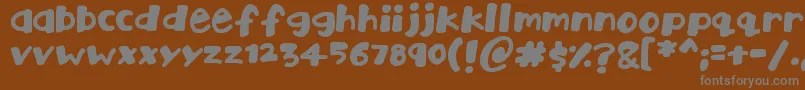 Playtime-Schriftart – Graue Schriften auf braunem Hintergrund