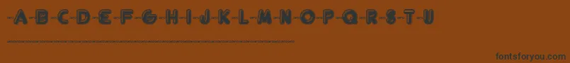 FtHelsingfurt Font – Black Fonts on Brown Background