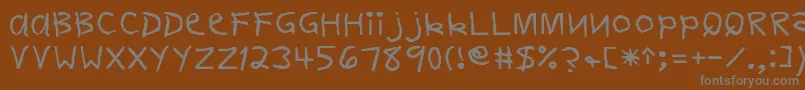 フォントFirstgraderNormal – 茶色の背景に灰色の文字