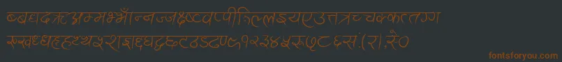 Шрифт AnandaAkchyar – коричневые шрифты на чёрном фоне