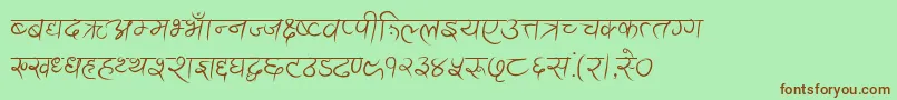 フォントAnandaAkchyar – 緑の背景に茶色のフォント