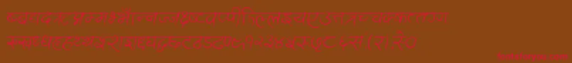 AnandaAkchyar Font – Red Fonts on Brown Background