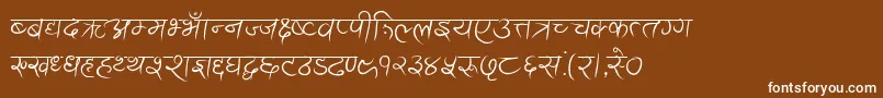 AnandaAkchyar Font – White Fonts on Brown Background