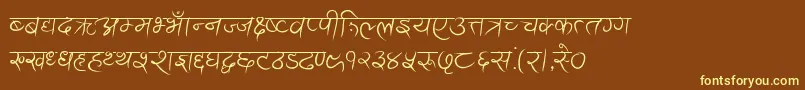 フォントAnandaAkchyar – 黄色のフォント、茶色の背景