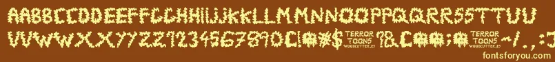 Terrortoons Font – Yellow Fonts on Brown Background