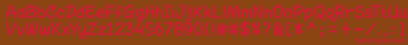 フォントAmarillregDemo – 赤い文字が茶色の背景にあります。