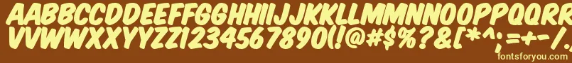 KomikaTitlePaint Font – Yellow Fonts on Brown Background