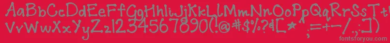 Addisababa-Schriftart – Graue Schriften auf rotem Hintergrund