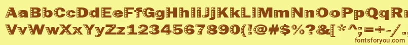 Uncey Font – Brown Fonts on Yellow Background