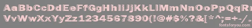 フォントUncey – 灰色の背景にピンクのフォント