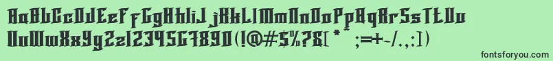 Blnktaperlucker Font – Black Fonts on Green Background