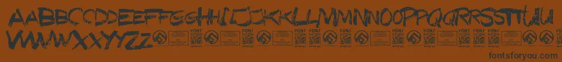 フォントTexasslaughterRegular – 黒い文字が茶色の背景にあります