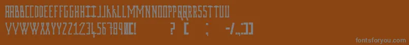 Prodigiumosdrugsv2-Schriftart – Graue Schriften auf braunem Hintergrund