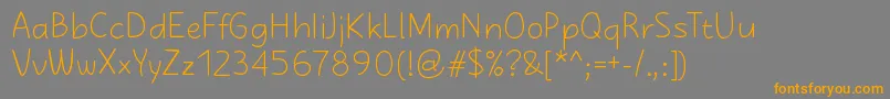 KasihRegular-Schriftart – Orangefarbene Schriften auf grauem Hintergrund