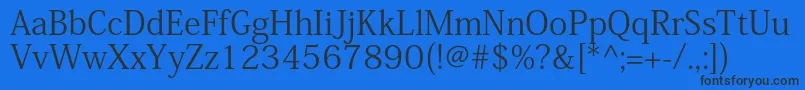 KozminproRegular Font – Black Fonts on Blue Background