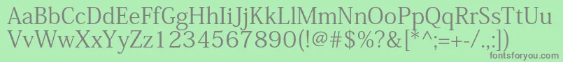 フォントKozminproRegular – 緑の背景に灰色の文字