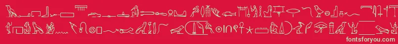 フォントPharaohglyphMedium – 赤い背景に緑の文字