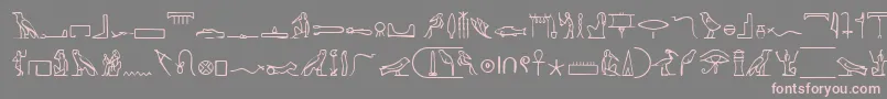 Czcionka PharaohglyphMedium – różowe czcionki na szarym tle