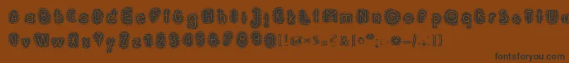 Шрифт PaperBeach – чёрные шрифты на коричневом фоне
