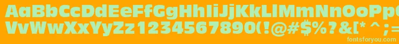 Inc901c-Schriftart – Grüne Schriften auf orangefarbenem Hintergrund