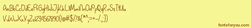 JanuaryHandwritingOtf Font – Brown Fonts on Yellow Background