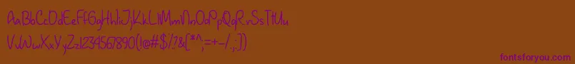 JanuaryHandwritingOtf Font – Purple Fonts on Brown Background