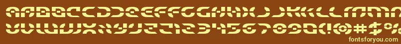 Starfighterexpand-fontti – keltaiset fontit ruskealla taustalla