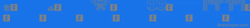 フォントAnadolu – 青い背景に灰色の文字