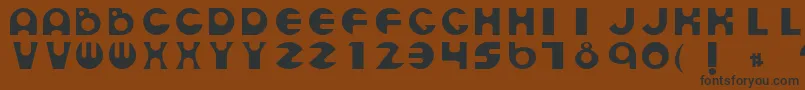 EspheresRegular Font – Black Fonts on Brown Background