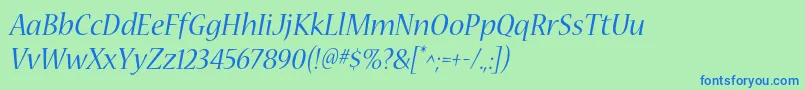 NuevastdItalic-fontti – siniset fontit vihreällä taustalla