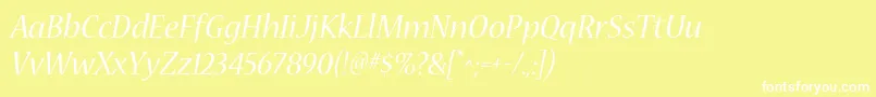 NuevastdItalic-fontti – valkoiset fontit keltaisella taustalla