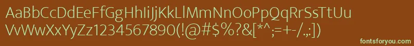EkmuktaExtralight-fontti – vihreät fontit ruskealla taustalla