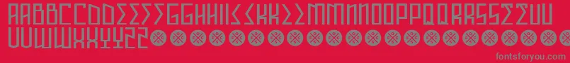 AnnihilatorDemo-fontti – harmaat kirjasimet punaisella taustalla