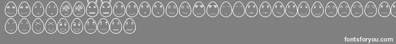 フォントEggfacesTfb – 灰色の背景に白い文字