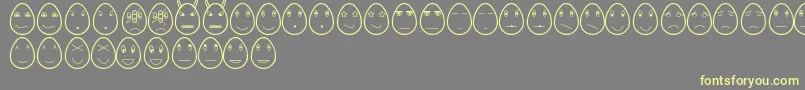 EggfacesTfb-Schriftart – Gelbe Schriften auf grauem Hintergrund