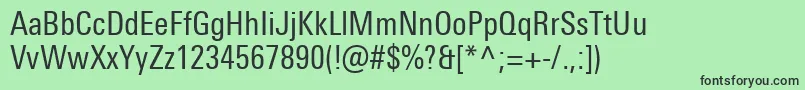 UniversNextProCondensed-fontti – mustat fontit vihreällä taustalla
