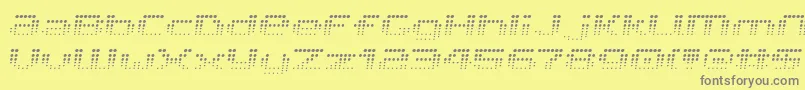 V5ProphitFading-fontti – harmaat kirjasimet keltaisella taustalla