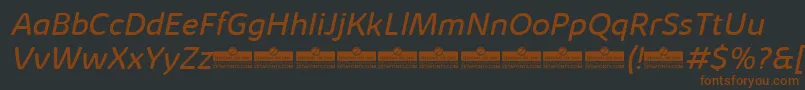 KabrioAbarthBookItalicTrial-fontti – ruskeat fontit mustalla taustalla