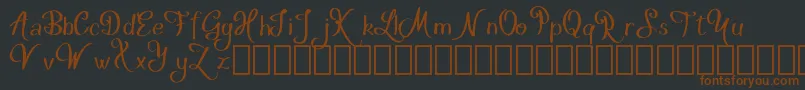 fuente HakytDemo – Fuentes Marrones Sobre Fondo Negro