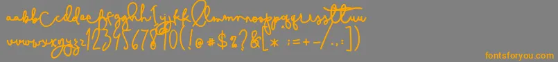 Шрифт Cestlaisabelly – оранжевые шрифты на сером фоне