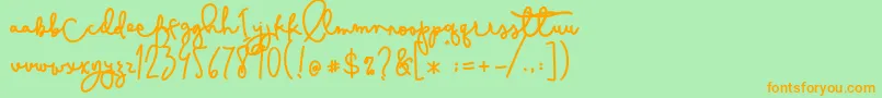 Cestlaisabelly-Schriftart – Orangefarbene Schriften auf grünem Hintergrund
