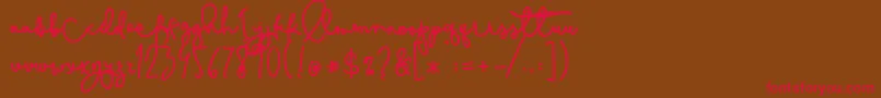 Cestlaisabelly Font – Red Fonts on Brown Background