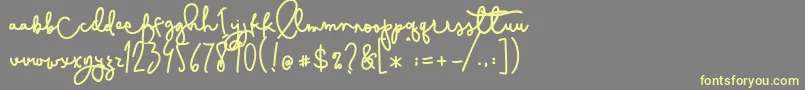 Cestlaisabelly Font – Yellow Fonts on Gray Background